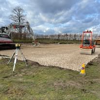 AG Rural Solutions inspecting and compacting an equestrian arena sub-base in Lincolnshire, ensuring correct levels, compaction, and drainage performance.